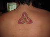 celtic knot tattoo on back